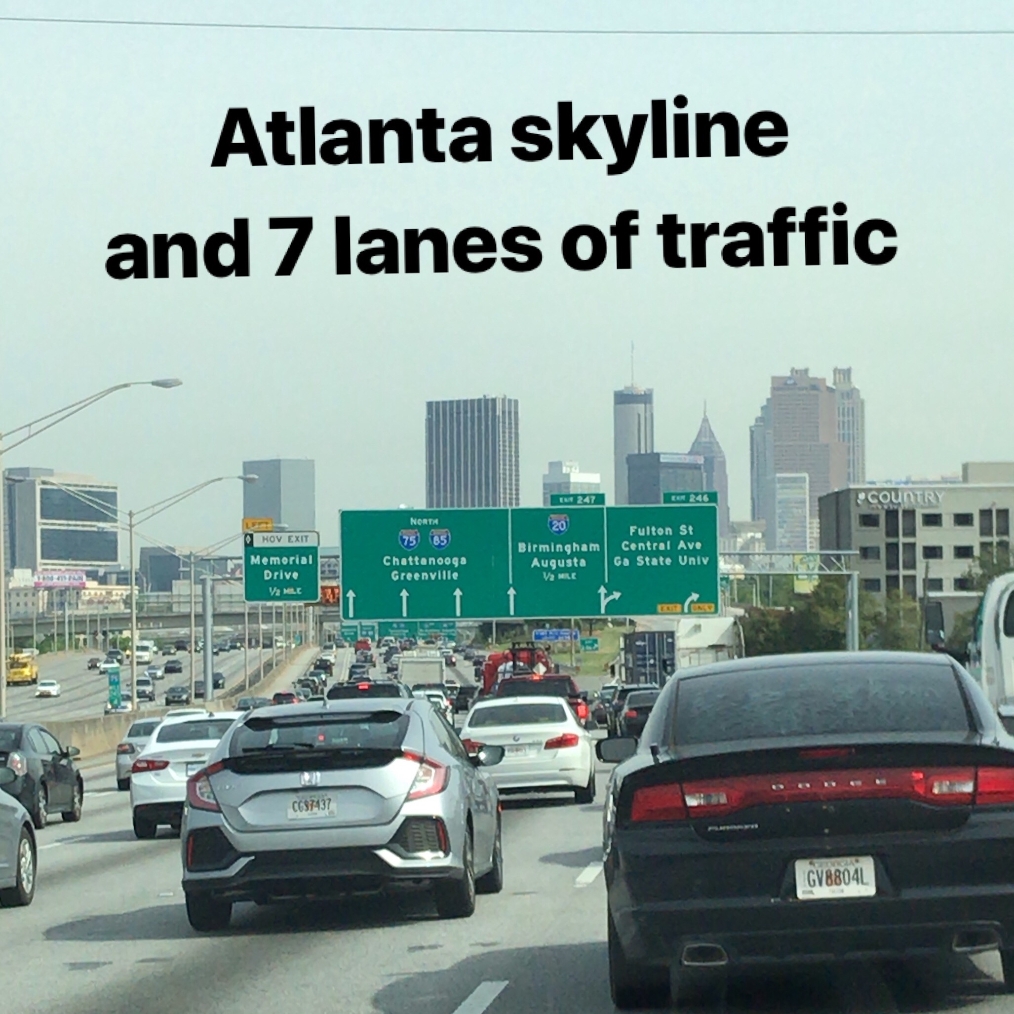 Atlanta skyline with seven lanes of traffic