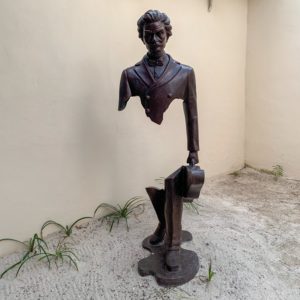 Statue of a man with a violin; Sculpture garden in Isla Mujeres, Mexico