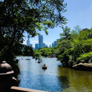 New York City Skyline and boats in water at Central Park, New York City