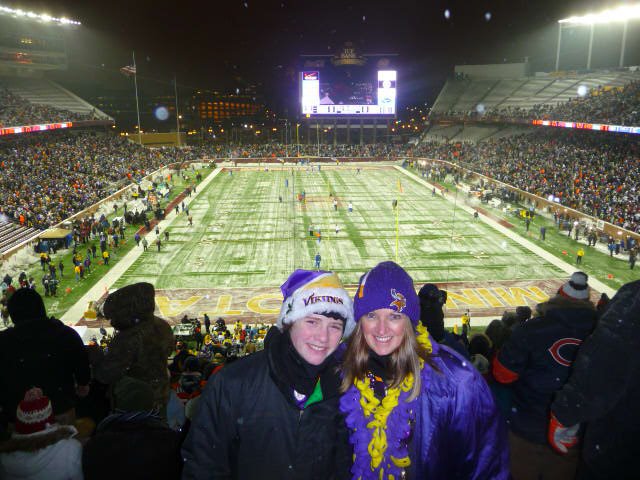 Mom and son at outdoor football game in winter