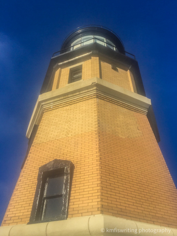 Lighthouse against a blue sky