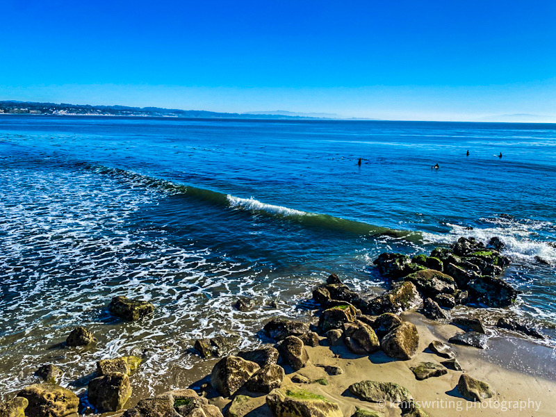 Surfers in Capitola near Santa Cruz California